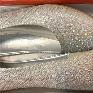 Silver sparkly flats.